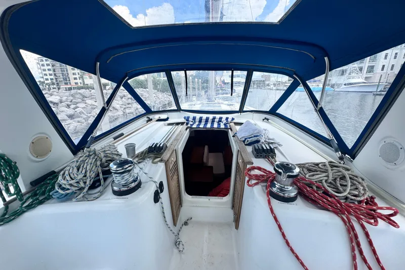  Yacht Photos Pics Cockpit view of 2011 Beneteau Oceanis 50 sailboat with ropes and winches.