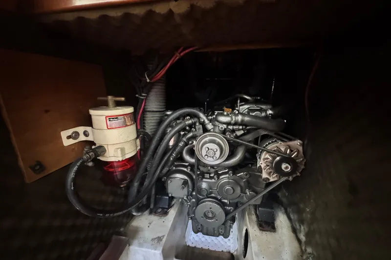  Yacht Photos Pics Engine compartment of a 2011 Beneteau Oceanis 50 sailboat, showcasing mechanical components.