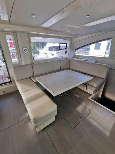 Adonis II Yacht Photos Pics Luxurious interior of 2017 Leopard 48 yacht with spacious seating and modern design.