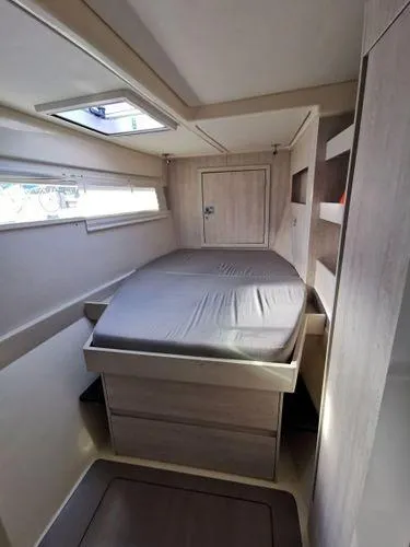 Adonis II Yacht Photos Pics 2017 Leopard 48 yacht cabin with bed, skylight, and modern interior design.