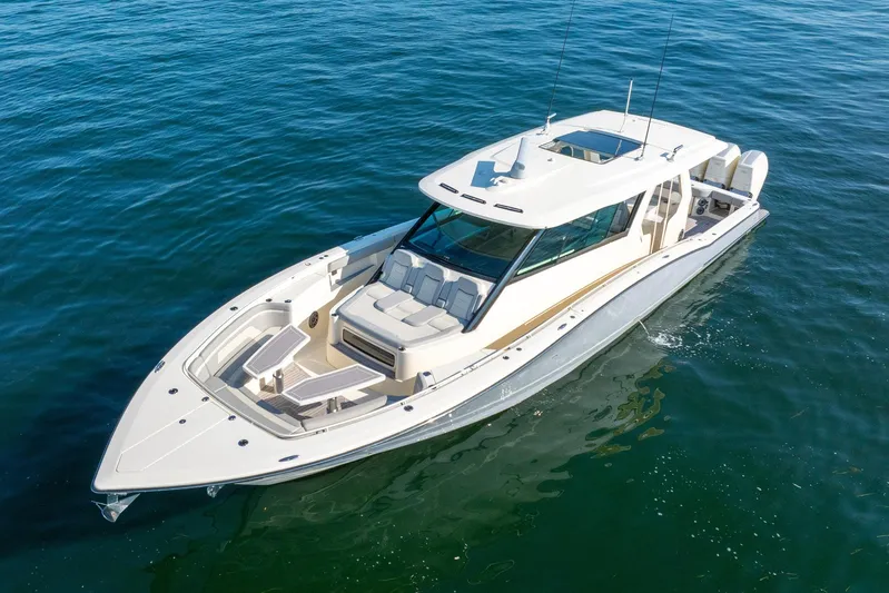 Dealership II Yacht Photos Pics 2023 Scout 530 LXF luxury boat cruising on open water.