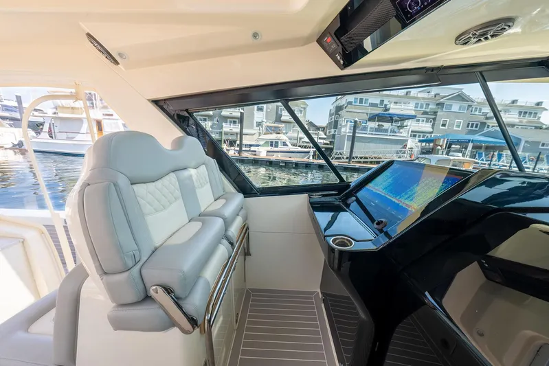 Dealership II Yacht Photos Pics 2023 Scout 530 LXF interior with luxurious seating and advanced navigation system.