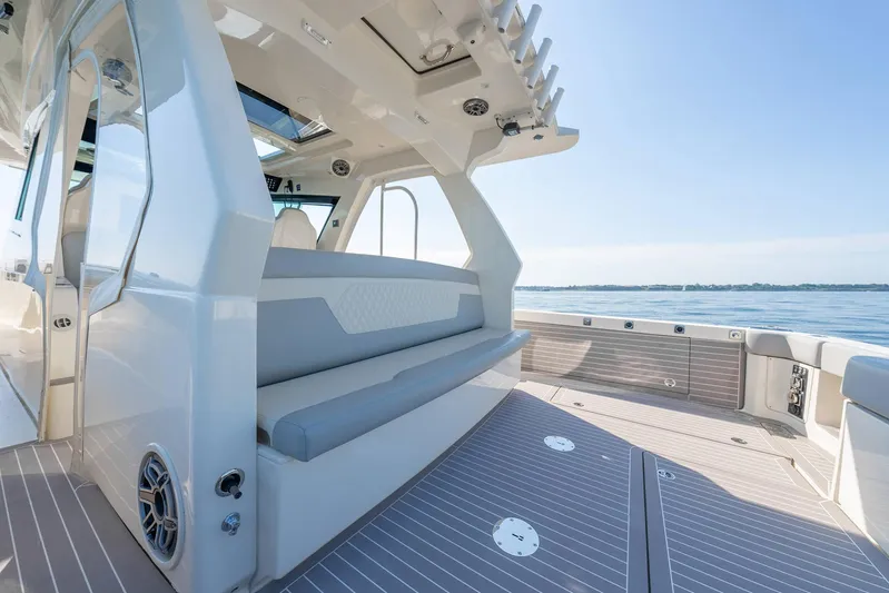 Dealership II Yacht Photos Pics 2023 Scout 530 LXF boat interior with sleek seating and ocean view.