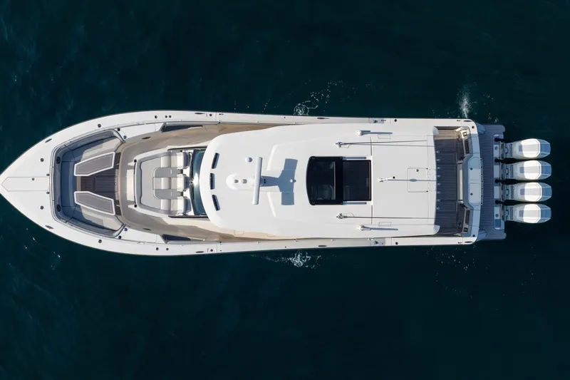 Dealership II Yacht Photos Pics Top view of 2023 Scout 530 LXF luxury yacht on open water.