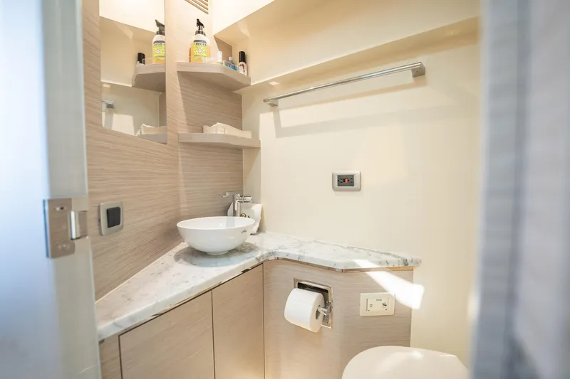 Dealership II Yacht Photos Pics Luxurious bathroom interior of 2023 Scout 530 LXF yacht with modern fixtures.