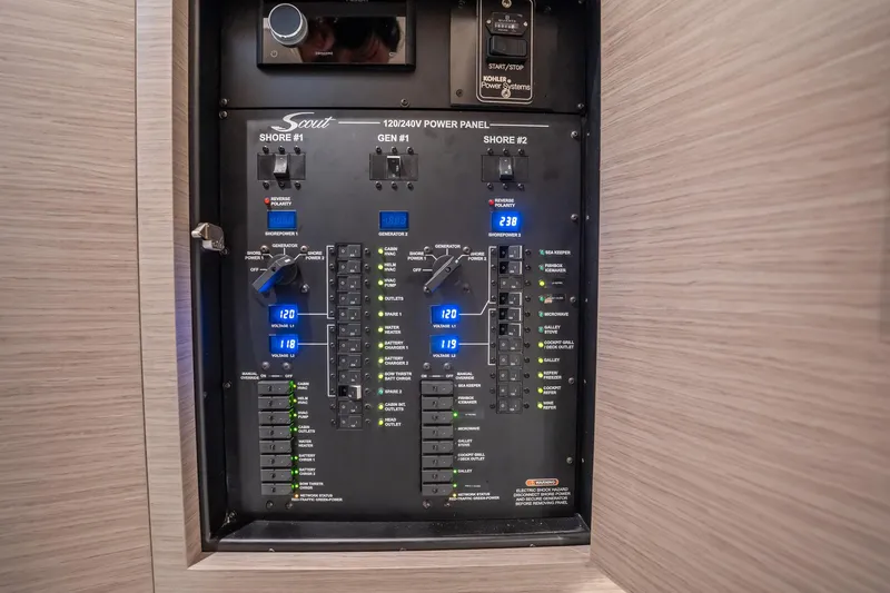 Dealership II Yacht Photos Pics 2023 Scout 530 LXF power panel with various controls and indicators.