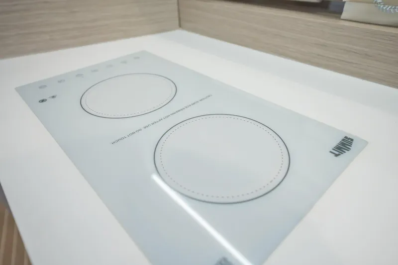 Dealership II Yacht Photos Pics Modern induction cooktop on 2023 Scout 530 LXF yacht, featuring sleek design and touch controls.