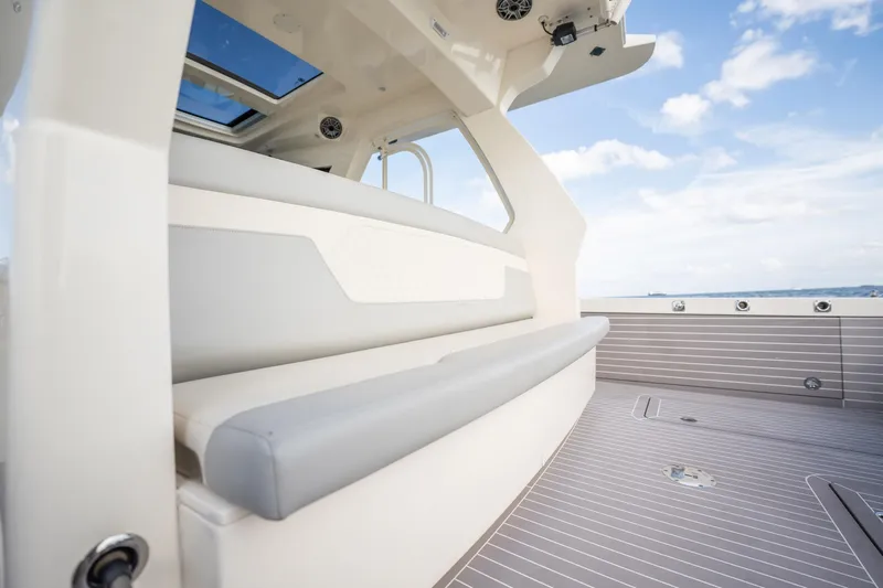 Dealership II Yacht Photos Pics 2023 Scout 530 LXF boat interior with sleek seating and modern design.