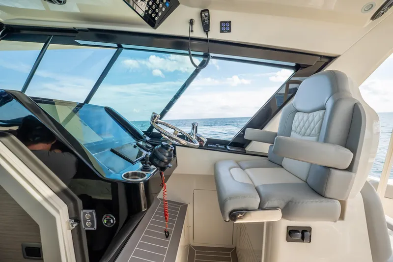 Dealership II Yacht Photos Pics 2023 Scout 530 LXF helm with luxurious seating and ocean view.