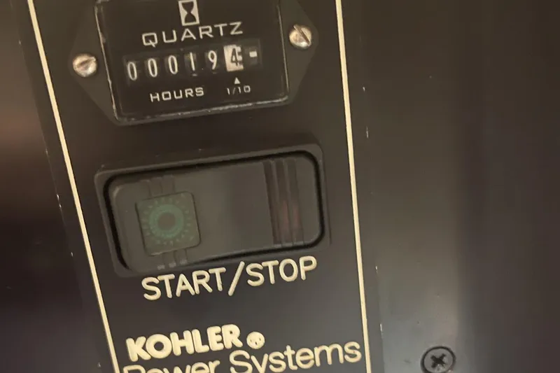 Dealership II Yacht Photos Pics 2023 Scout 530 LXF Kohler power system with hour meter and start/stop switch.