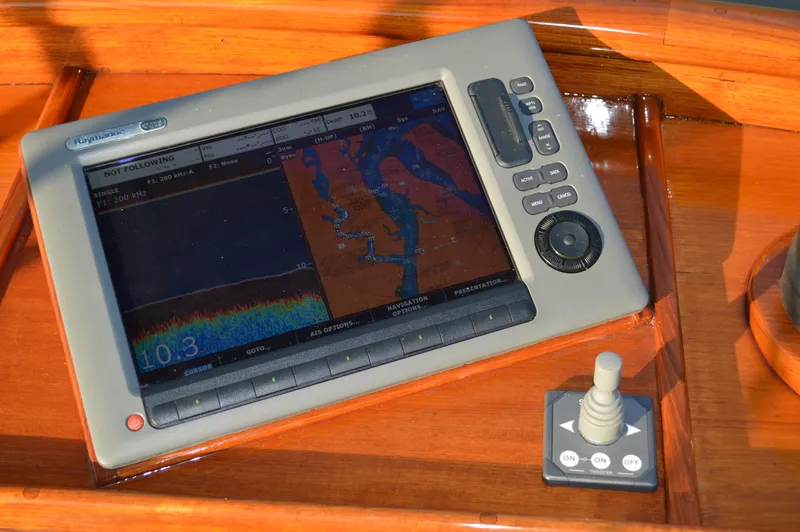 Safari Yacht Photos Pics Navigation system on 1990 Stanley Downeast Lobster Yacht's wooden dashboard.