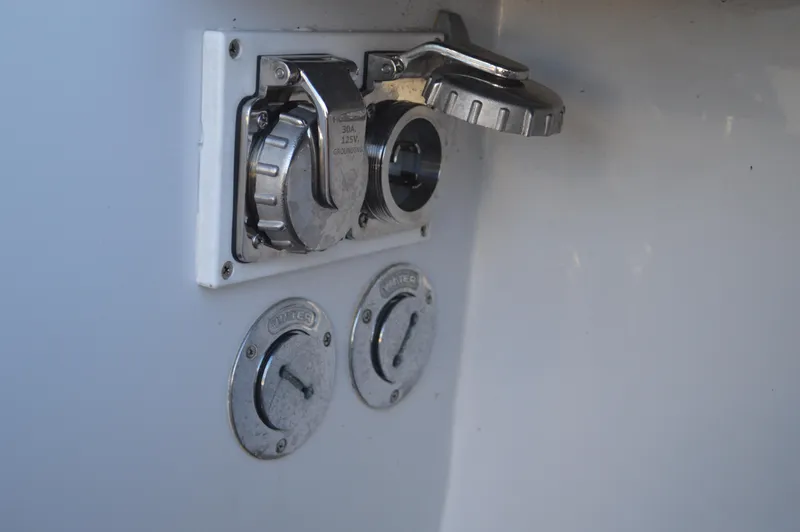 Safari Yacht Photos Pics Fuel and water caps on a 1990 Stanley Downeast Lobster Boat.