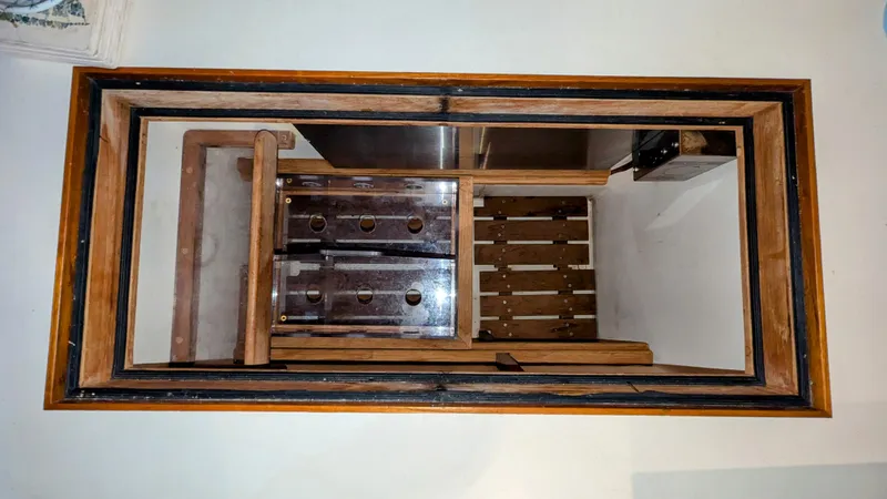 Safari Yacht Photos Pics Wooden interior of a 1990 Stanley Downeast Lobster Boat, showcasing craftsmanship and design.