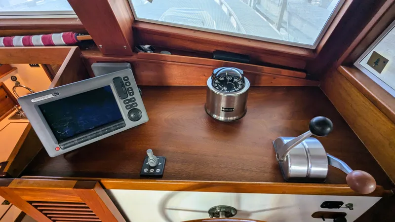 Safari Yacht Photos Pics 1990 Stanley Downeast Lobster Boat cockpit with navigation equipment and controls.