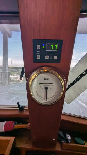 Safari Yacht Photos Pics Control panel of a 1990 Stanley Downeast Lobster Yacht with digital and analog gauges.