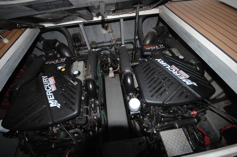  Yacht Photos Pics Engine compartment of 2002 Sea Ray 380 Sundancer with twin Mercury engines.