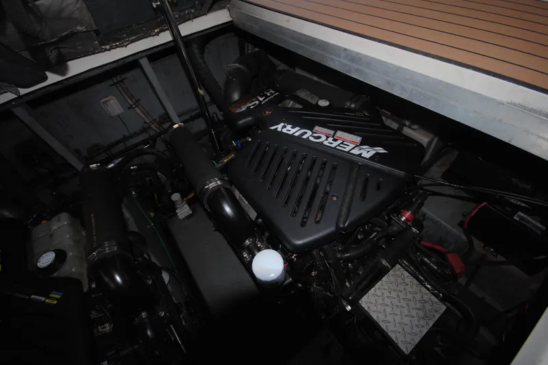 Yacht Photos Pics Engine compartment of a 2002 Sea Ray 380 Sundancer with a Mercury engine.