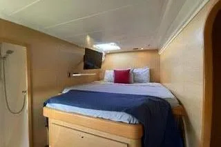  Yacht Photos Pics 2008 Lagoon 420 yacht interior cabin with bed and shower.