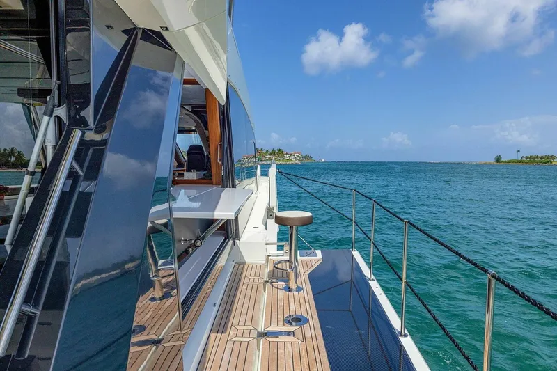  Yacht Photos Pics 2019 Galeon 640 Fly yacht deck with ocean view and clear blue sky.