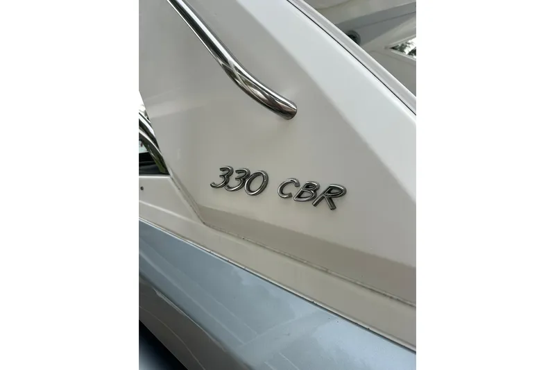 Oceanholic Yacht Photos Pics 2018 Formula 330 Crossover Bowrider boat exterior with model emblem.