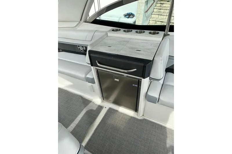 Oceanholic Yacht Photos Pics 2018 Formula 330 Crossover Bowrider interior with sleek seating and built-in storage.