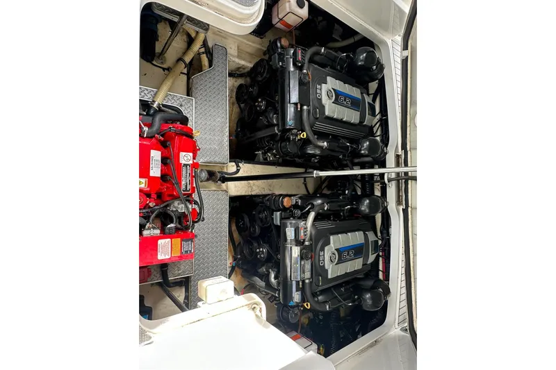 Oceanholic Yacht Photos Pics Engine compartment of a 2018 Formula 330 Crossover Bowrider, featuring dual G2 engines.