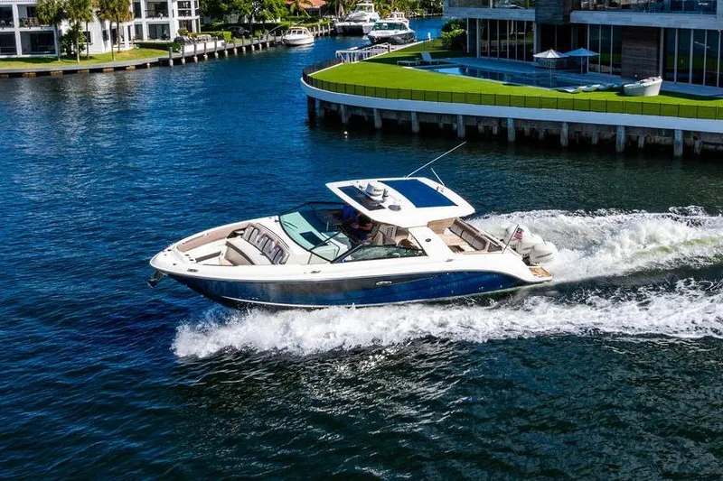 Sobe III Yacht Photos Pics 2019 Sea Ray SLX 400 Outboard cruising on a scenic waterway.