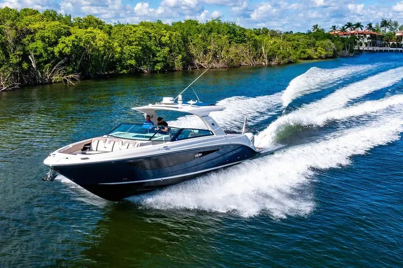 Sobe III Yacht Photos Pics 2019 Sea Ray SLX 400 Outboard cruising on a scenic waterway.