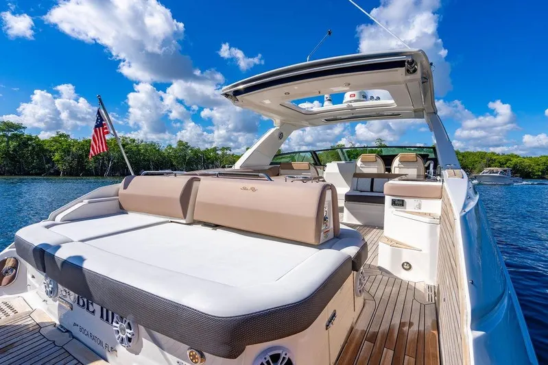 Sobe III Yacht Photos Pics 2019 Sea Ray SLX 400 Outboard luxury boat on a sunny day, featuring spacious deck.
