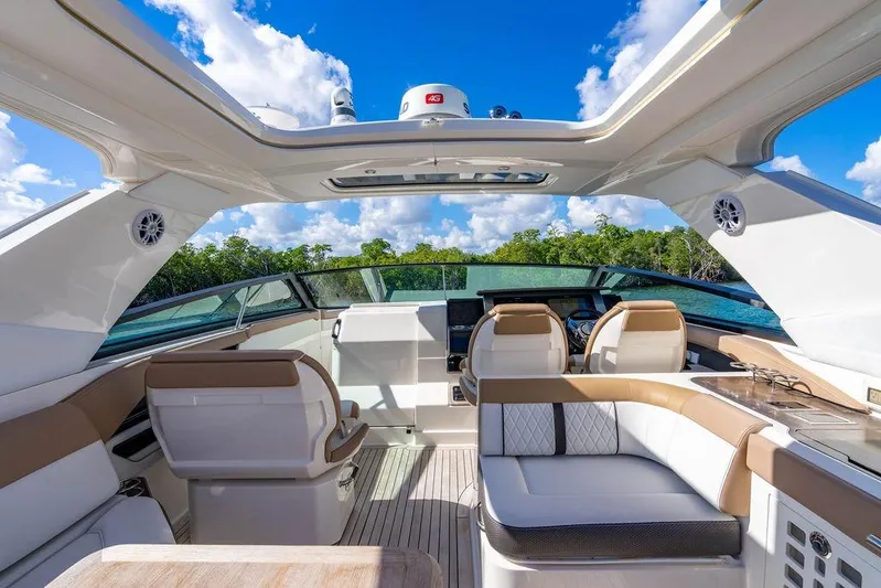 Sobe III Yacht Photos Pics Luxurious 2019 Sea Ray SLX 400 Outboard interior with plush seating and modern design.