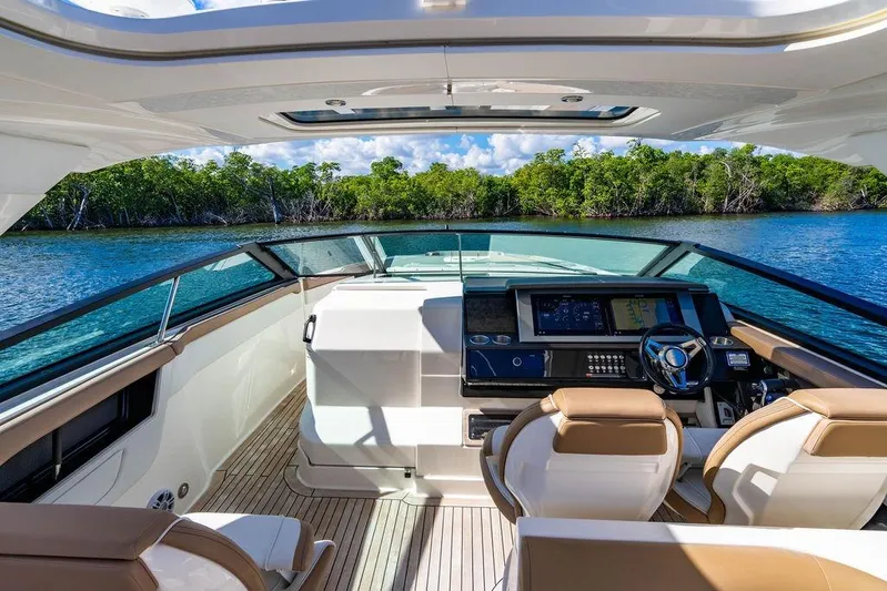 Sobe III Yacht Photos Pics 2019 Sea Ray SLX 400 Outboard cockpit with luxurious seating and advanced navigation system.