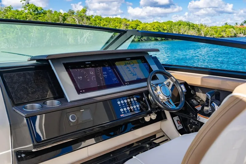 Sobe III Yacht Photos Pics 2019 Sea Ray SLX 400 Outboard helm with modern navigation displays and controls.