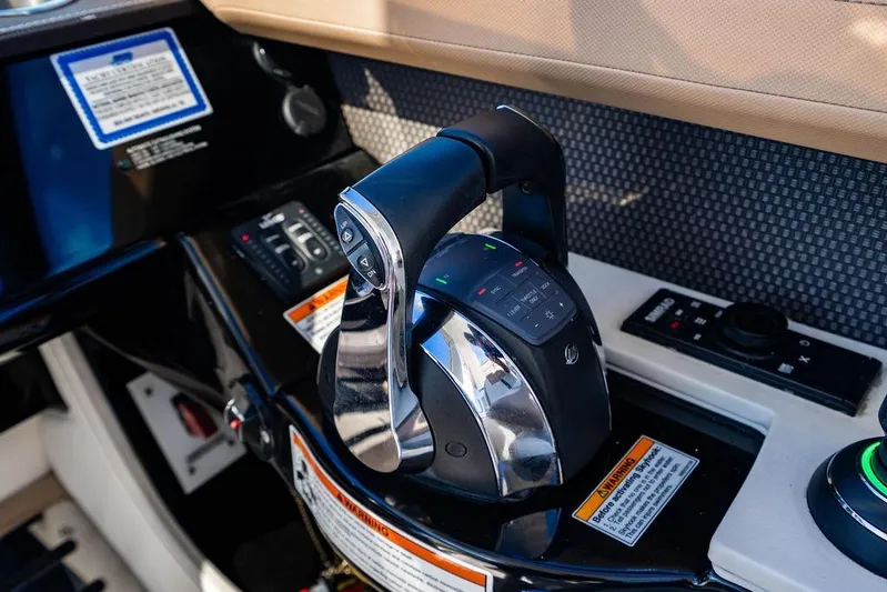 Sobe III Yacht Photos Pics Control panel of 2019 Sea Ray SLX 400 Outboard boat with throttle and navigation controls.