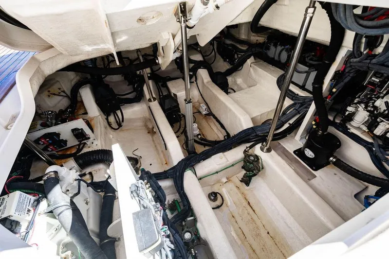 Sobe III Yacht Photos Pics Engine compartment of 2019 Sea Ray SLX 400 Outboard, showcasing mechanical components and wiring.