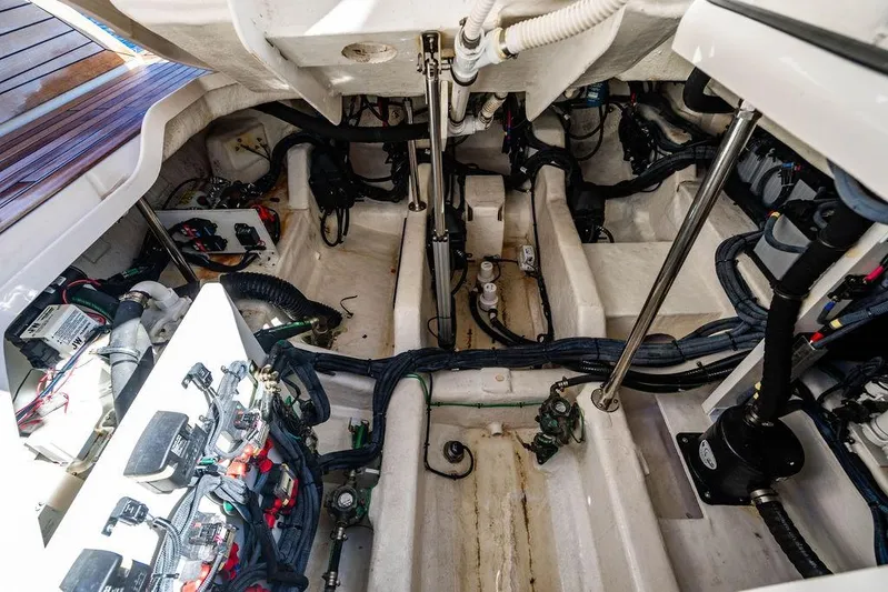 Sobe III Yacht Photos Pics Engine compartment of 2019 Sea Ray SLX 400 Outboard, showcasing wiring and mechanical components.