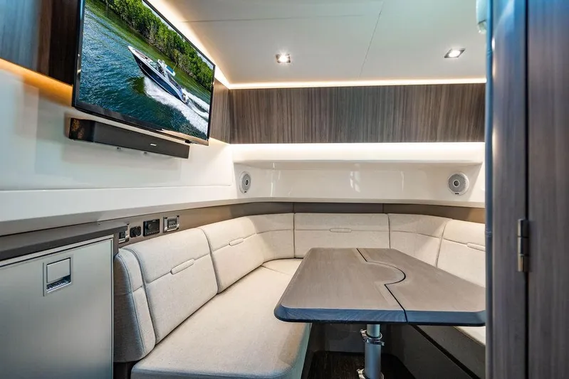 Sobe III Yacht Photos Pics Luxurious interior of 2019 Sea Ray SLX 400 Outboard with plush seating and modern amenities.