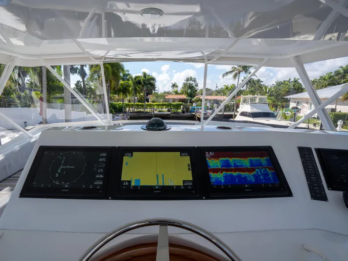 Samurai Yacht Photos Pics Cockpit view of 1998 Viking 58 Convertible yacht with advanced navigation displays.