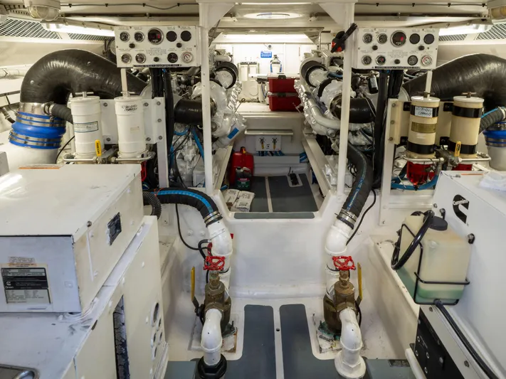 Samurai Yacht Photos Pics Engine room of a 1998 Viking 58 Convertible yacht, showcasing machinery and equipment.