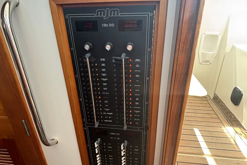 Tango Yacht Photos Pics Electrical control panel on a 2006 MJM 34z Downeast boat interior.