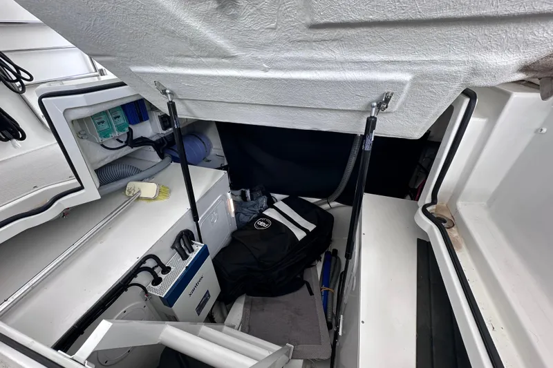  Yacht Photos Pics Interior of 2024 Beneteau Flyer 10 boat, showing storage and equipment area.