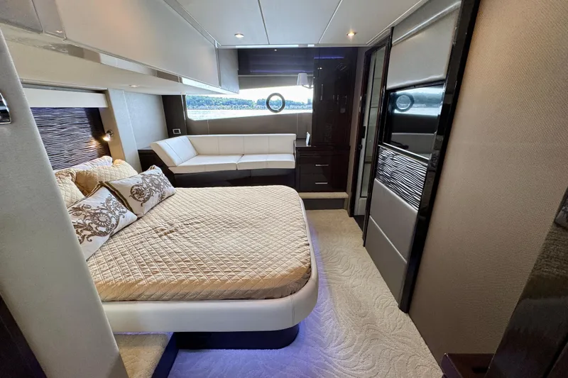 Orion Yacht Photos Pics Luxurious interior of 2018 Carver C52 Coupe yacht with elegant bedroom design.