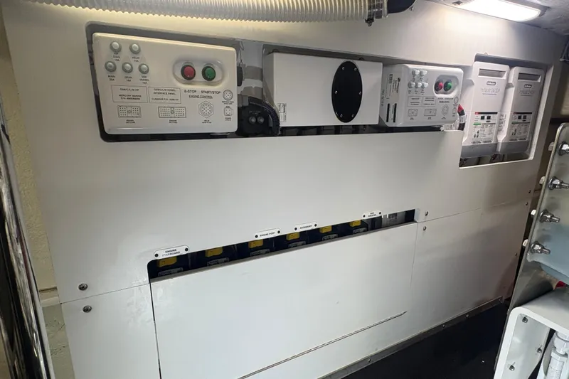 Orion Yacht Photos Pics Control panel inside 2018 Carver C52 Coupe, featuring various switches and indicators.