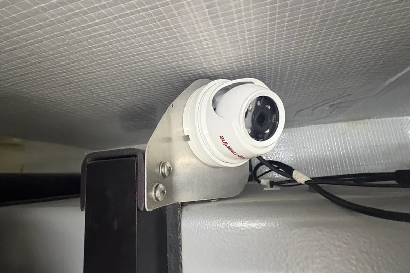 Orion Yacht Photos Pics Security camera installed on a Carver C52 Coupe 2018, mounted on a metal bracket.