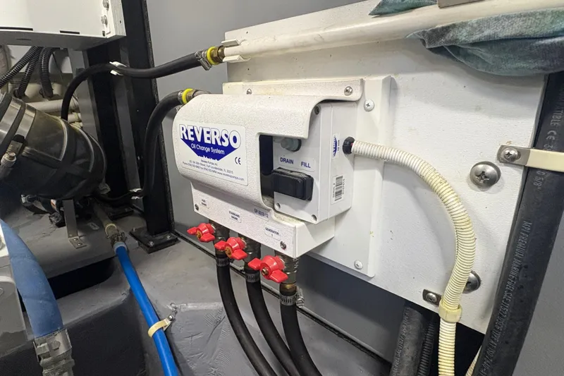 Orion Yacht Photos Pics Reverso oil change system in 2018 Carver C52 Coupe engine room.