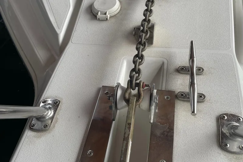  Yacht Photos Pics Anchor chain and cleat on 2000 Carver 400 Express boat deck.