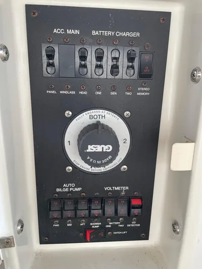  Yacht Photos Pics Control panel of a 2000 Carver 400 Express boat with battery charger and switches.