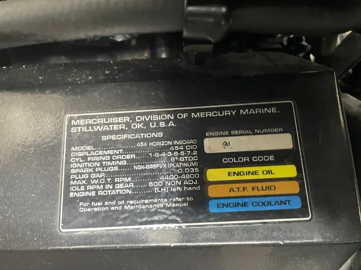  Yacht Photos Pics Engine specifications label on a 2000 Carver 400 Express, detailing MerCruiser model and maintenance info.