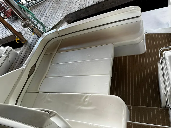  Yacht Photos Pics White leather seating on 2000 Carver 400 Express boat deck.