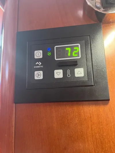 Monlove Yacht Photos Pics Thermostat control panel on 2007 Beneteau Oceanis Clipper 393 yacht displaying 72 degrees.