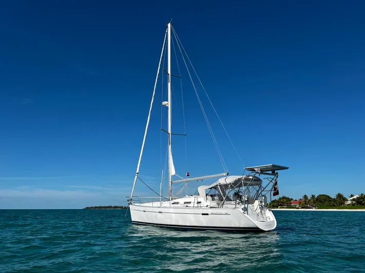 Monlove Yacht Photos Pics 2007 Beneteau Oceanis Clipper 393 sailboat on calm blue water under clear sky.